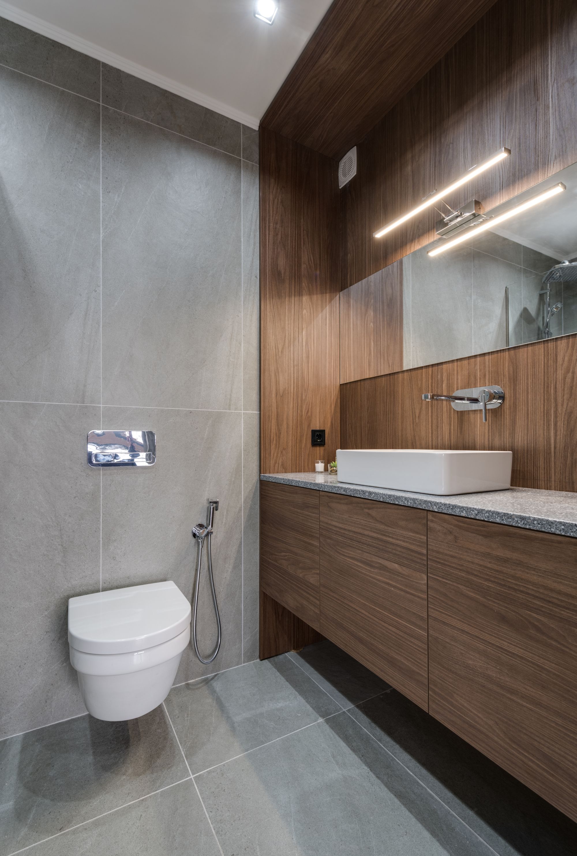 Compact powder room vanity with sealed-edge detailing in Don Mills
